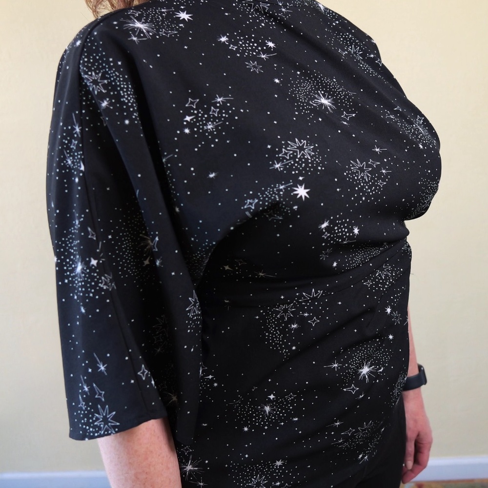 Topshop black blouse with star print, UK size 12 (US size 8)